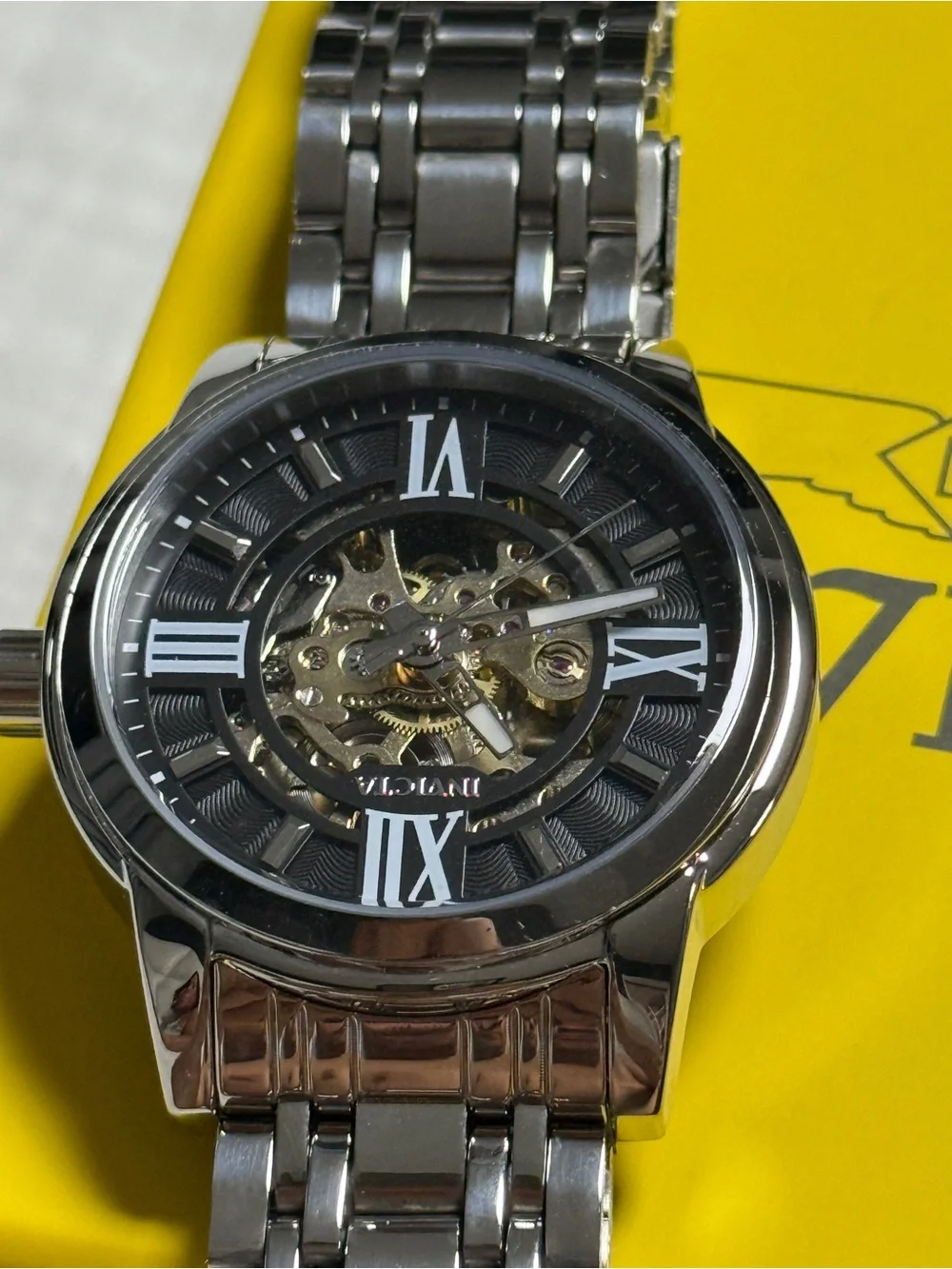Invicta Silver Stainless Steel Men's Watch with Black Skeleton Dial